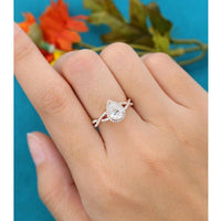 1.00CT Pear Cut Rose Gold Halo Set Twisted Diamond Moissanite Engagement Ring - JBR Jeweler