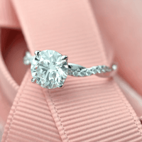 1.5CT Classic Round Cut Solitaire Moissanite Twist Shank Engagement Ring - JBR Jeweler