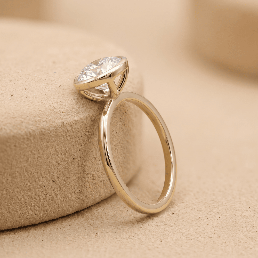 Round bezel diamond ring side profile