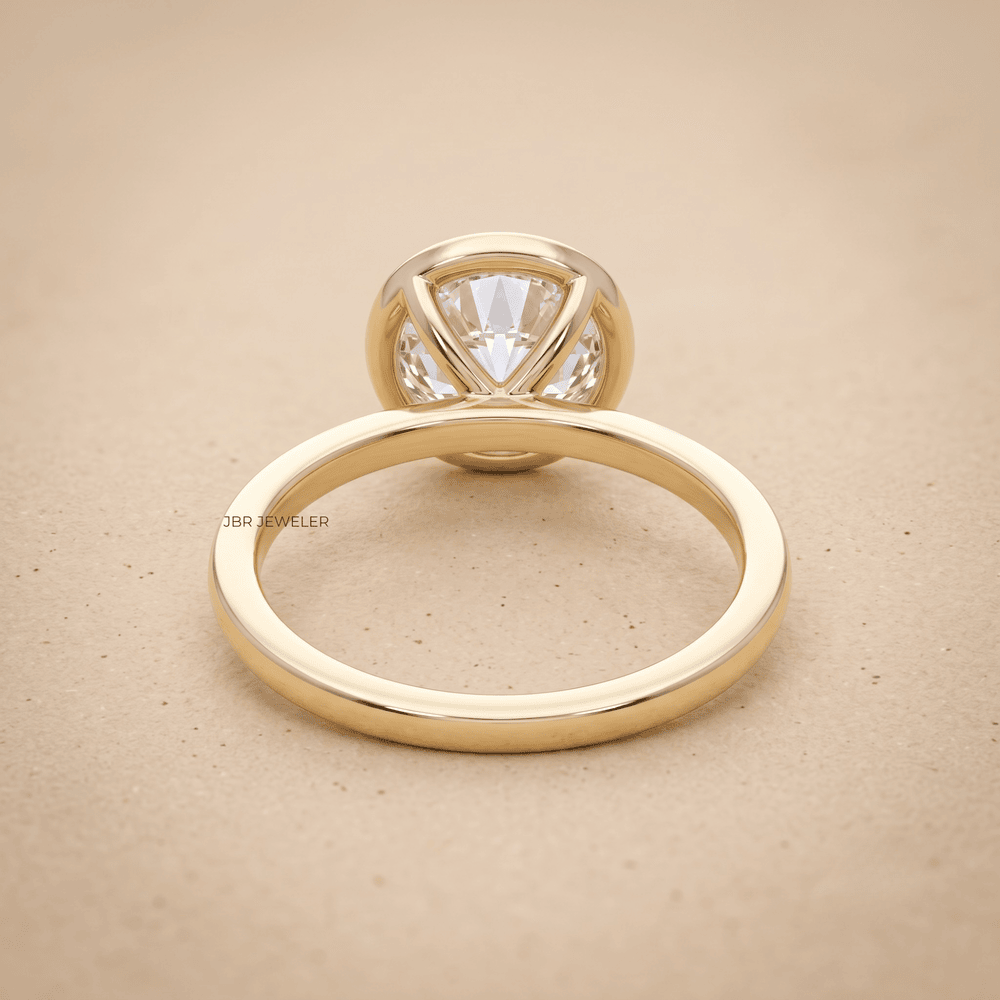 Round cut lab grown diamond in bezel setting