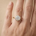 Classic round diamond engagement ring on hand