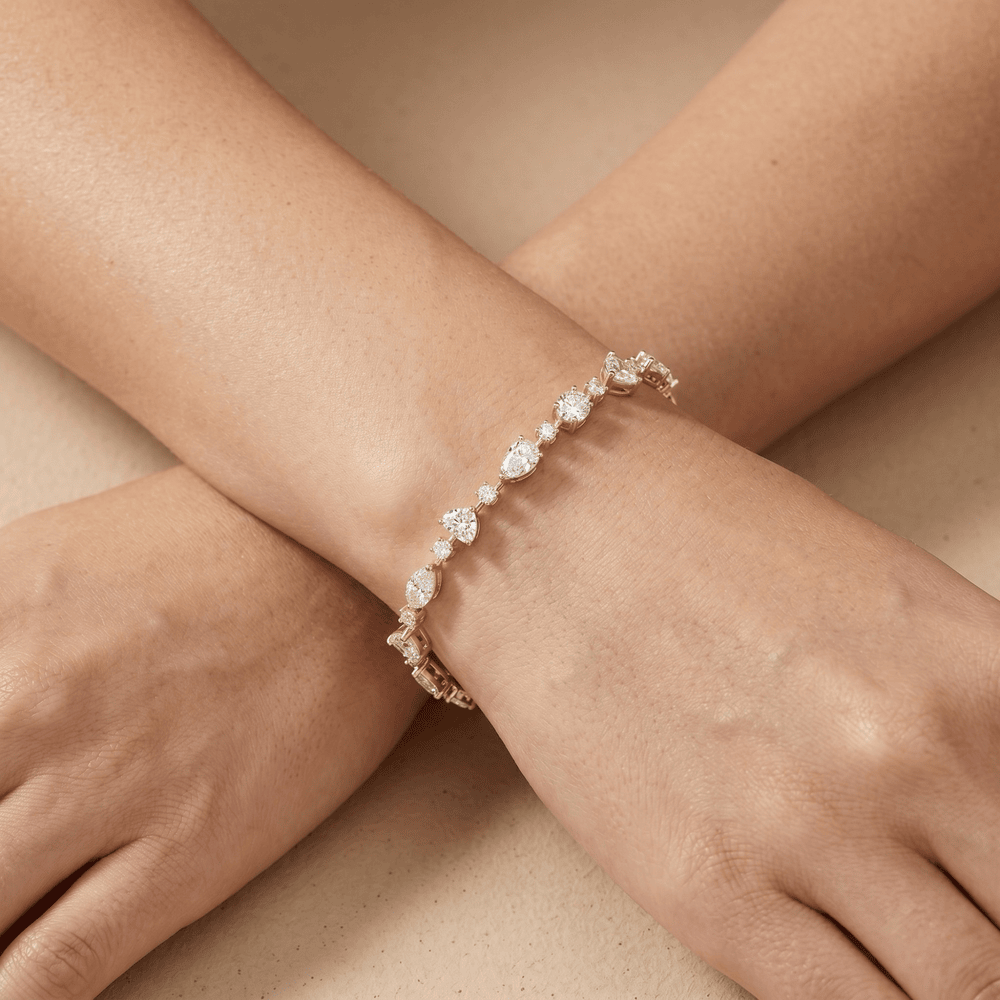 Multi shape diamond gold bracelet