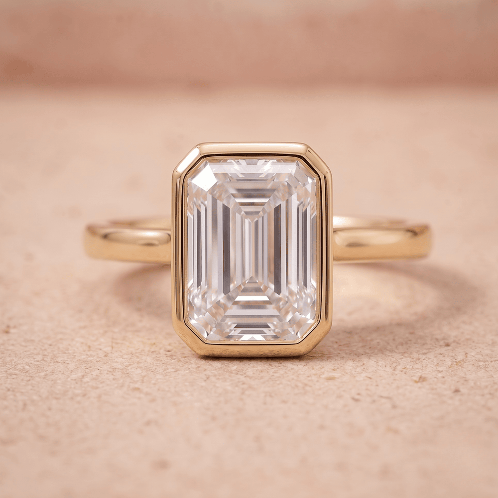 14K emerald bezel set solitaire engagement ring with moissanite