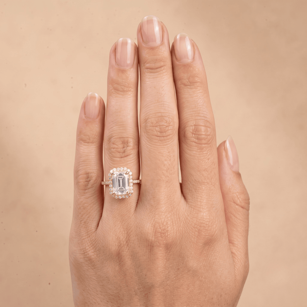 Halo engagement ring paired with wedding band