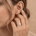 Round halo wedding ring worn on hand