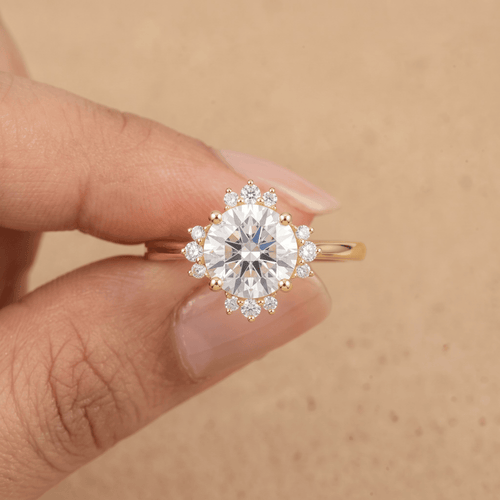 Round halo wedding ring worn on hand