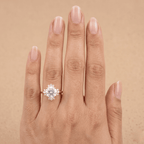 Round halo wedding ring worn on hand