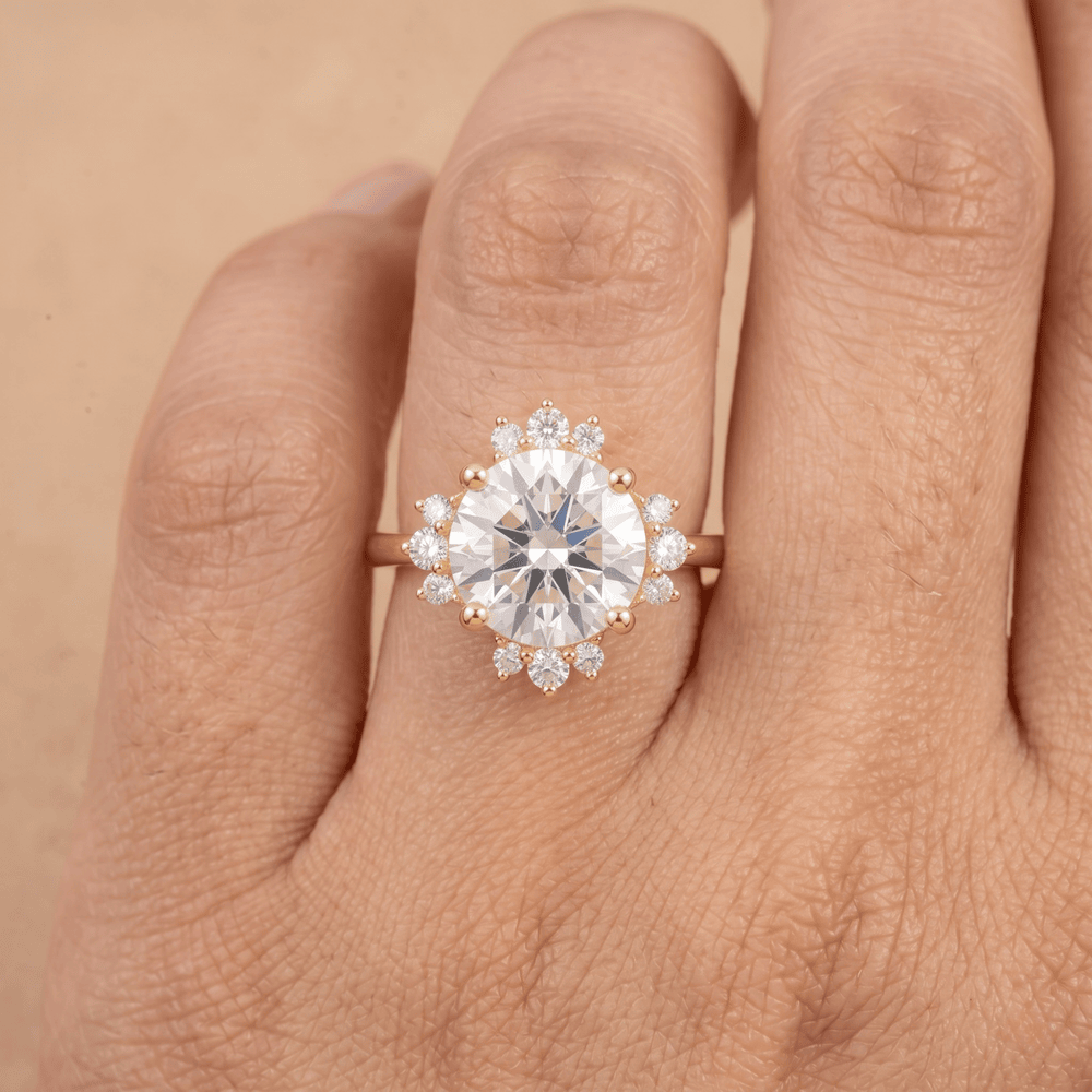 Round halo wedding ring worn on hand