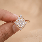Gold filigree pear diamond halo ring