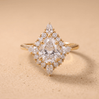 Floral inspired pear cut lab diamond halo engagement ring