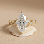 14K gold ring featuring an elongated marquise diamond