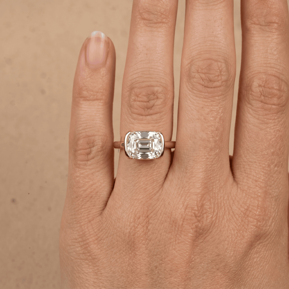 East west cushion diamond solitaire ring