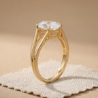 Split shank oval diamond ring in 14K gold on hand