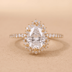 Sunburst pear cut lab diamond halo ring in 14K gold