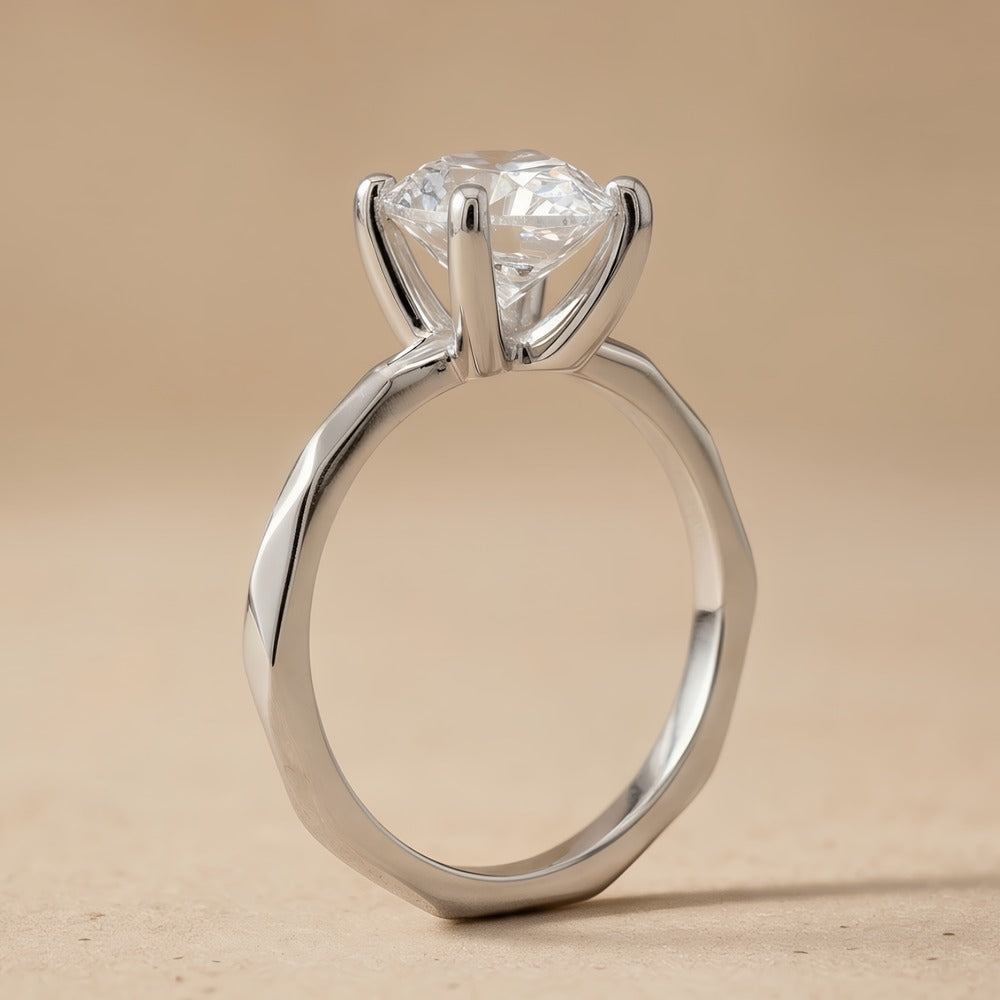 Side view of pear lab grown diamond solitaire in 14K White gold band