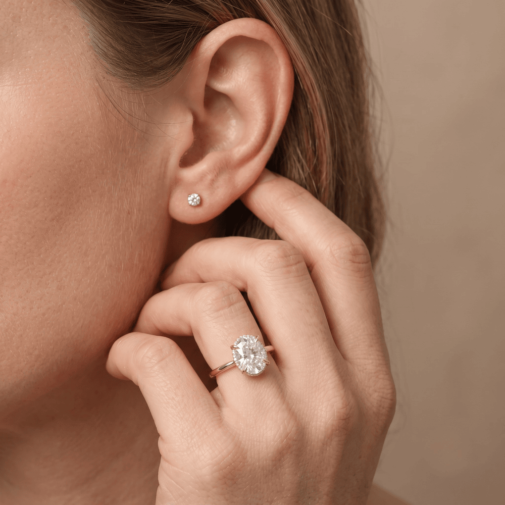 Dual halo oval promise ring style worn on hand