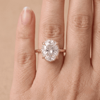 Oval cut diamond dual halo ring hand model wearing