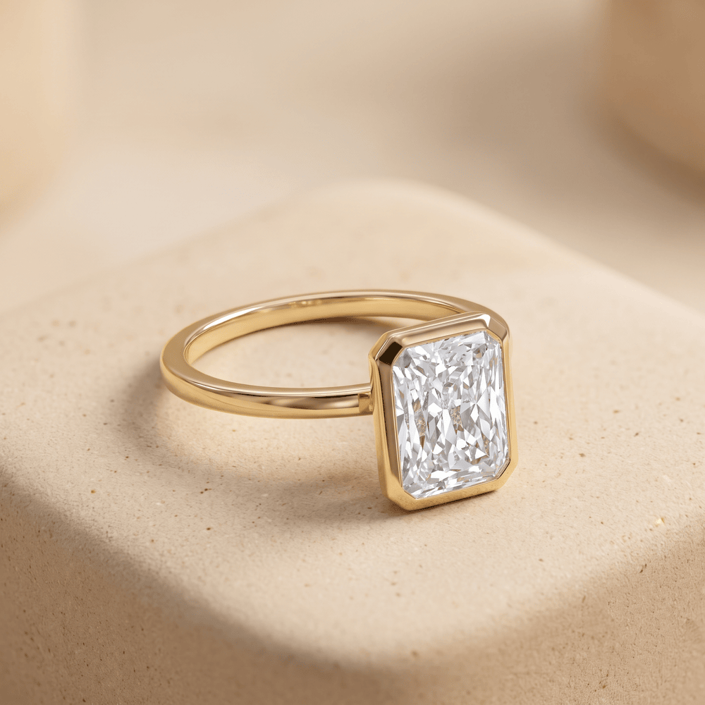 14K gold bezel set radiant engagement ring side profile