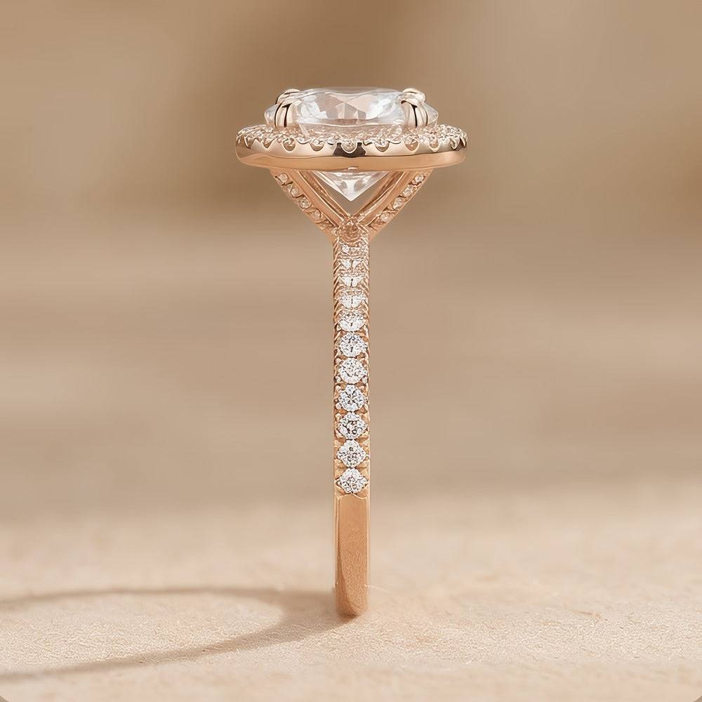 Diamond halo engagement ring stacked with matching wedding band