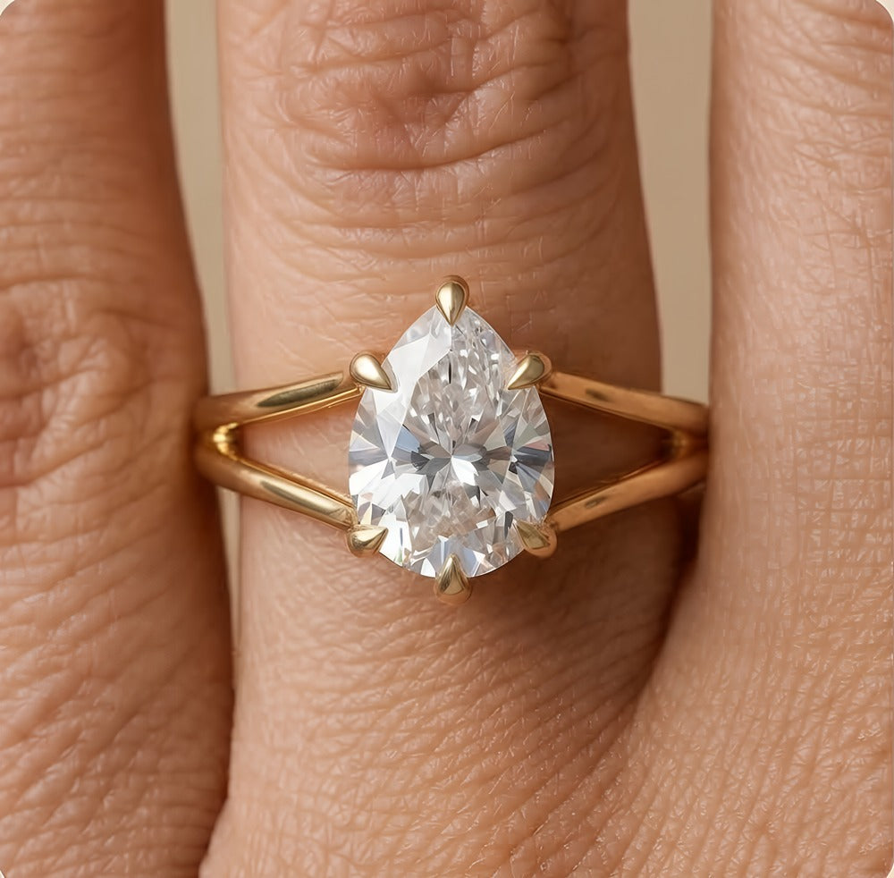 14K gold pear cut promise ring worn on hand for her