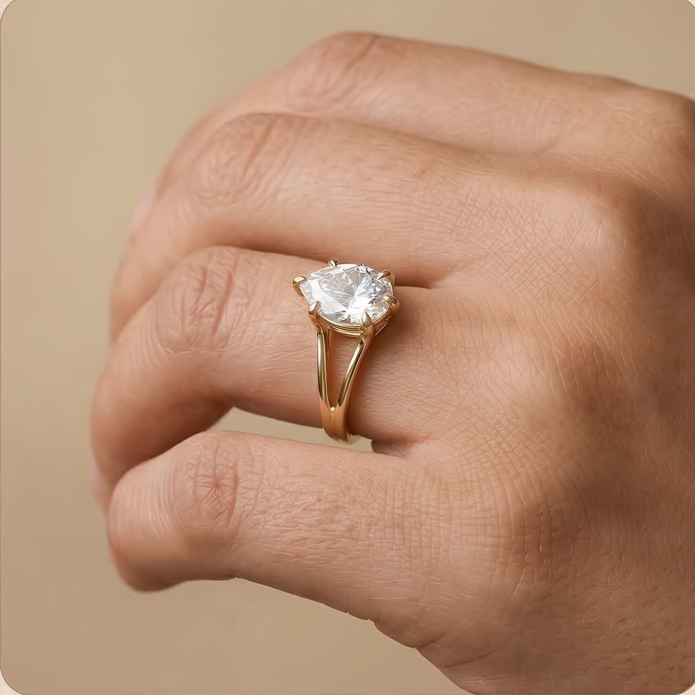 14K gold pear cut promise ring worn on hand for her