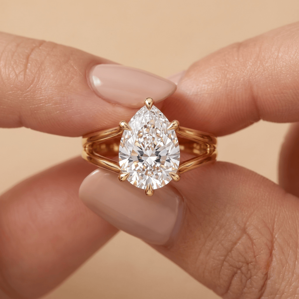 Lab diamond pear cut solitaire ring profile view, 14K gold