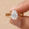 14K gold pear cut promise ring worn on hand for her