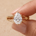 14K gold pear cut promise ring worn on hand for her