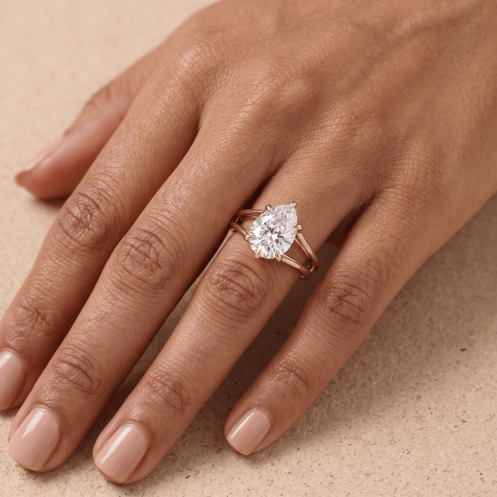14K gold pear cut promise ring worn on hand for her