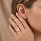 Oval halo ring lifestyle shot on hand