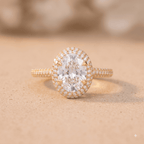 Petite oval lab diamond halo engagement ring in gold