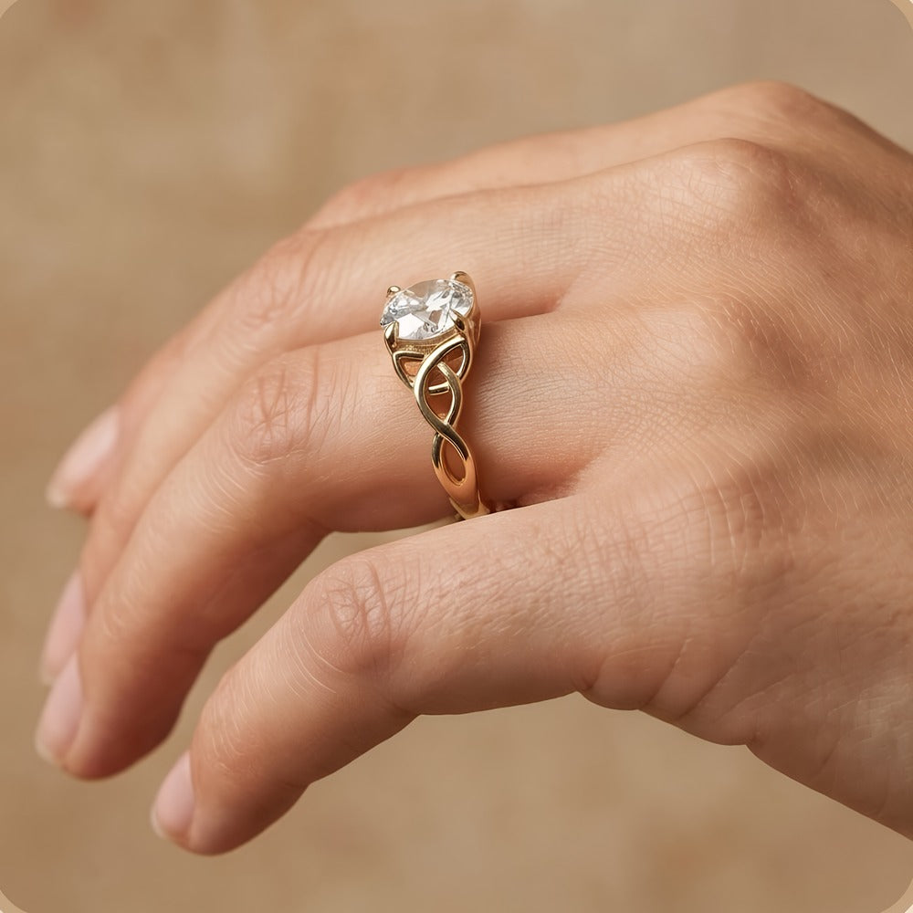 Celtic dragon ring styled on model's hand