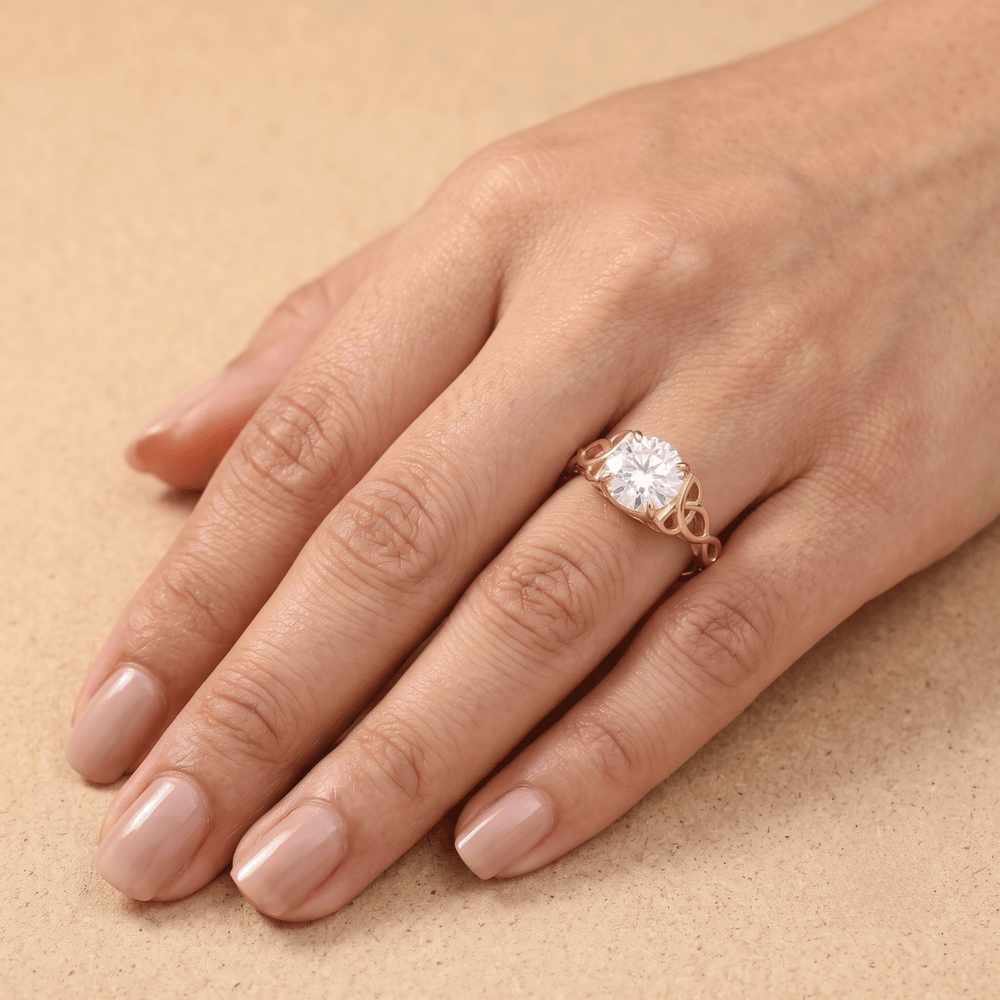 Celtic dragon ring styled on model's hand