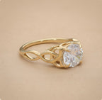 Celtic dragon engagement ring featuring round cut diamond center stone