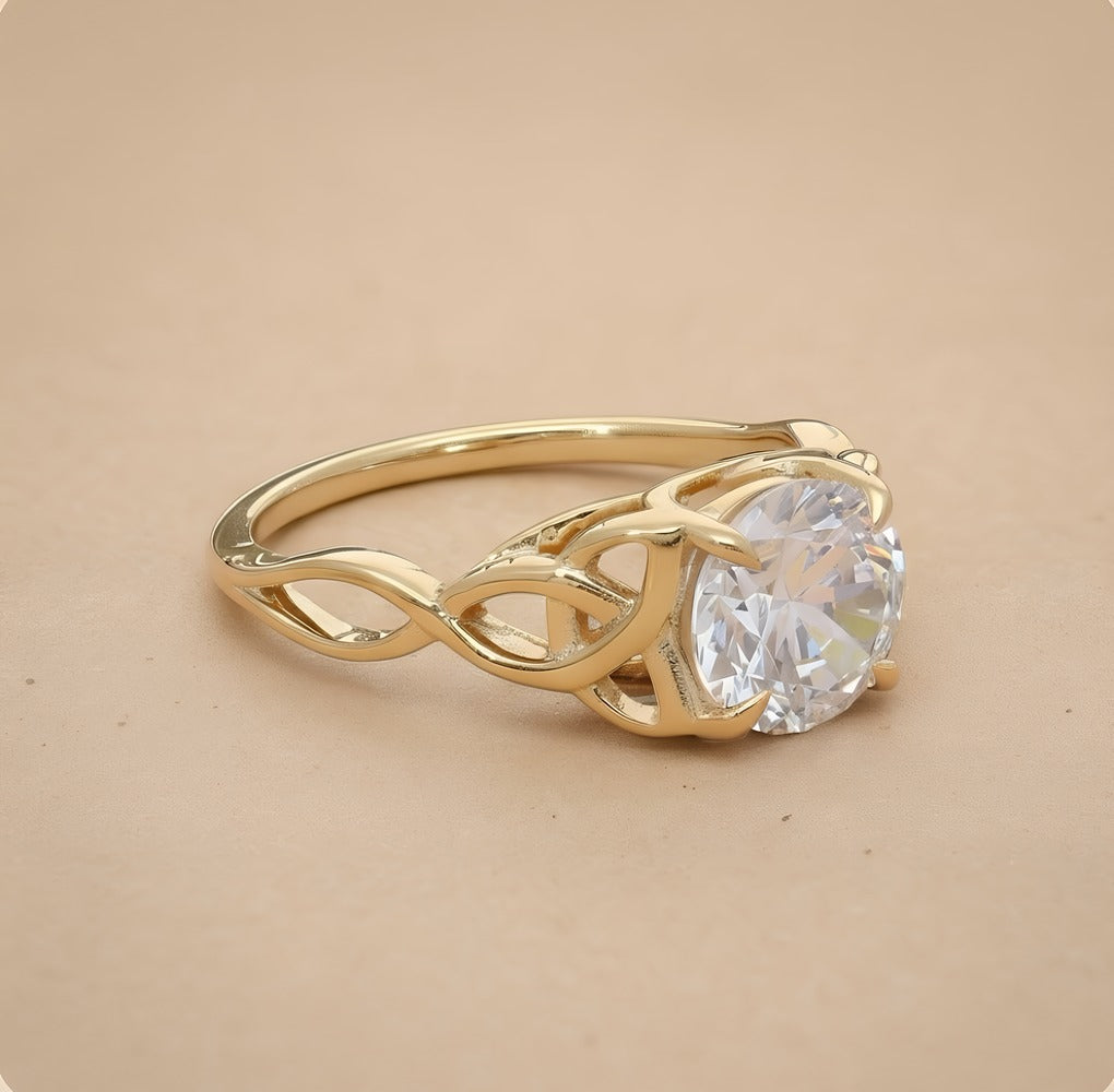 Celtic dragon engagement ring featuring round cut diamond center stone