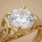 Celtic dragon ring close-up showing intricate gold detailing
