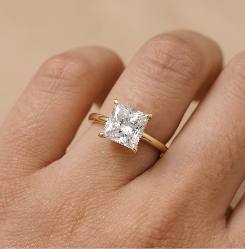 Lab grown diamond princess cut ring on model hand