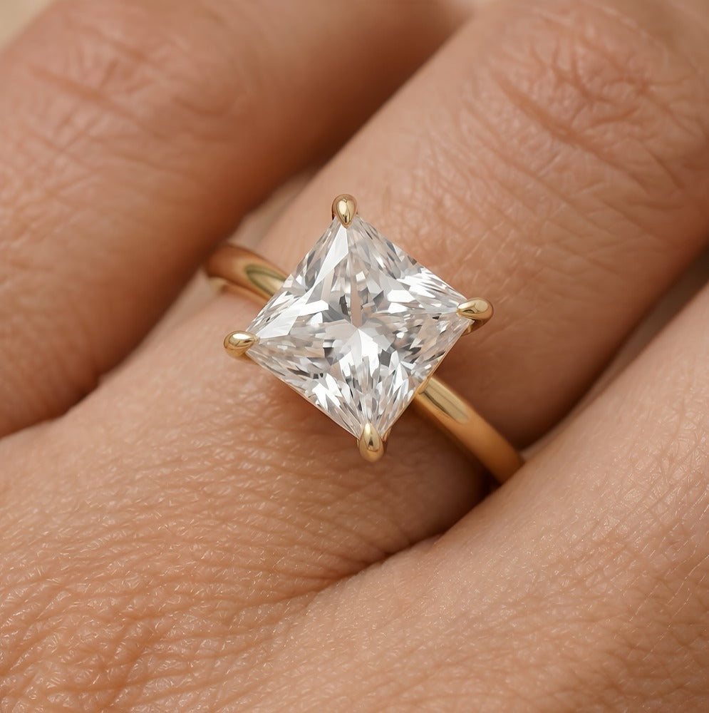 Lab grown diamond princess cut ring on model hand