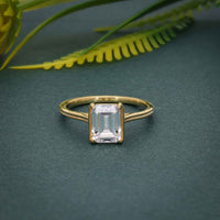 Silhouette Emerald Moissanite Diamond Engagement Ring