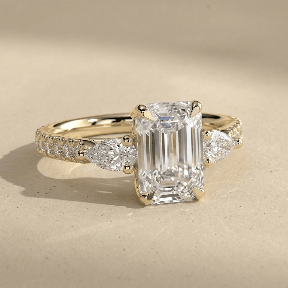 Emerald cut lab diamond engagement ring with pavé band