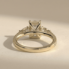 Pavé set three stone emerald diamond wedding ring