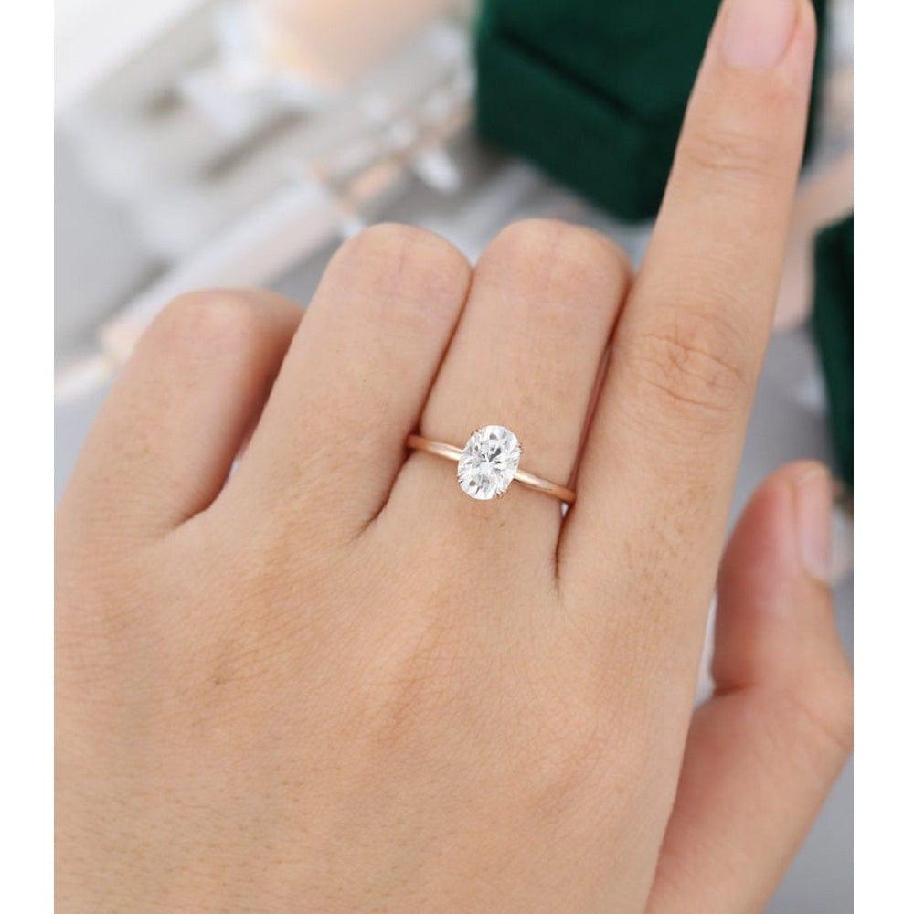Oval Cut Solitaire Rose Gold Double Claw Prong Moissanite