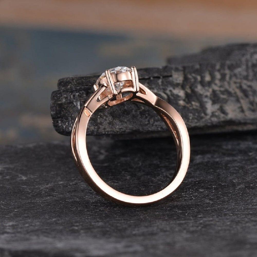 Pear Shaped Rose Gold Solitaire Intertwined Moissanite