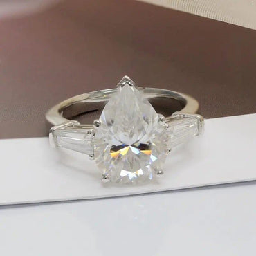 2.10CT Pear Cut Side Baguette Three Stone Moissanite Engagement Ring - JBR Jeweler