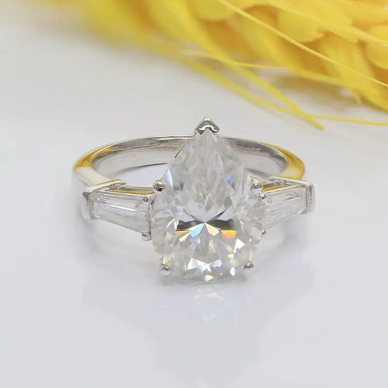 2.10CT Pear Cut Side Baguette Three Stone Moissanite Engagement Ring - JBR Jeweler