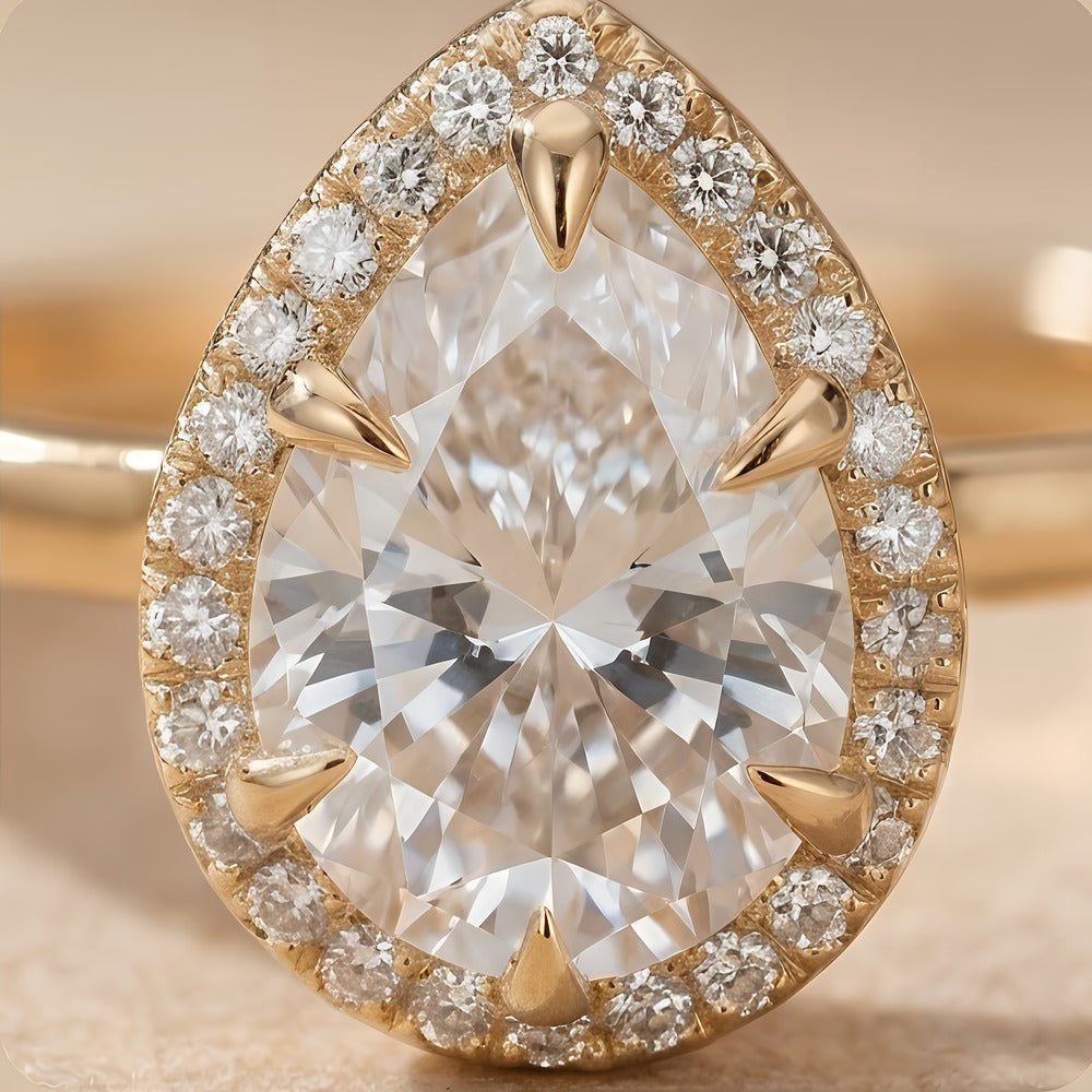 2CT pear moissanite halo ring in 14K gold