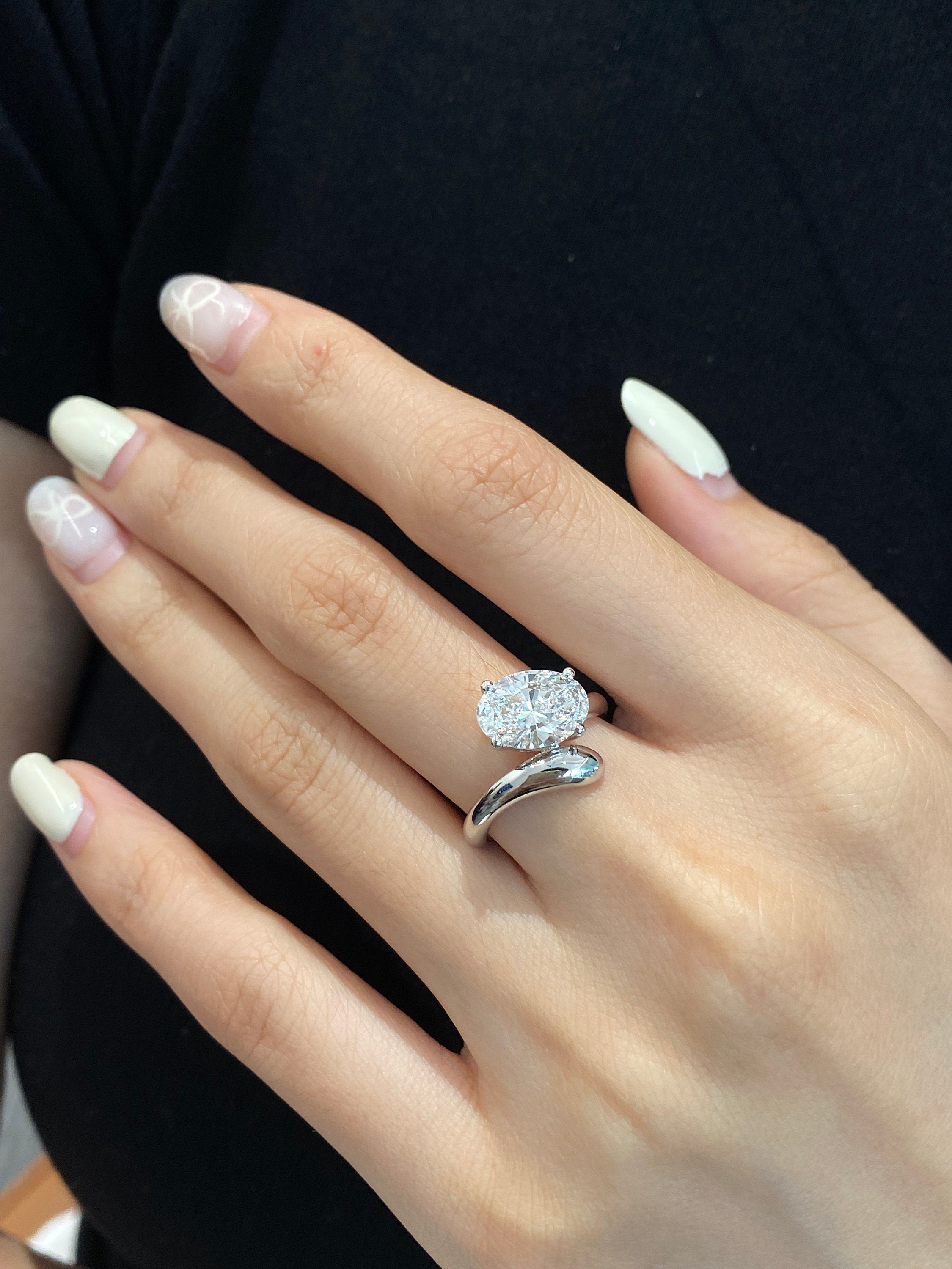 A bold 3.25 CT oval lab diamond ring for forever