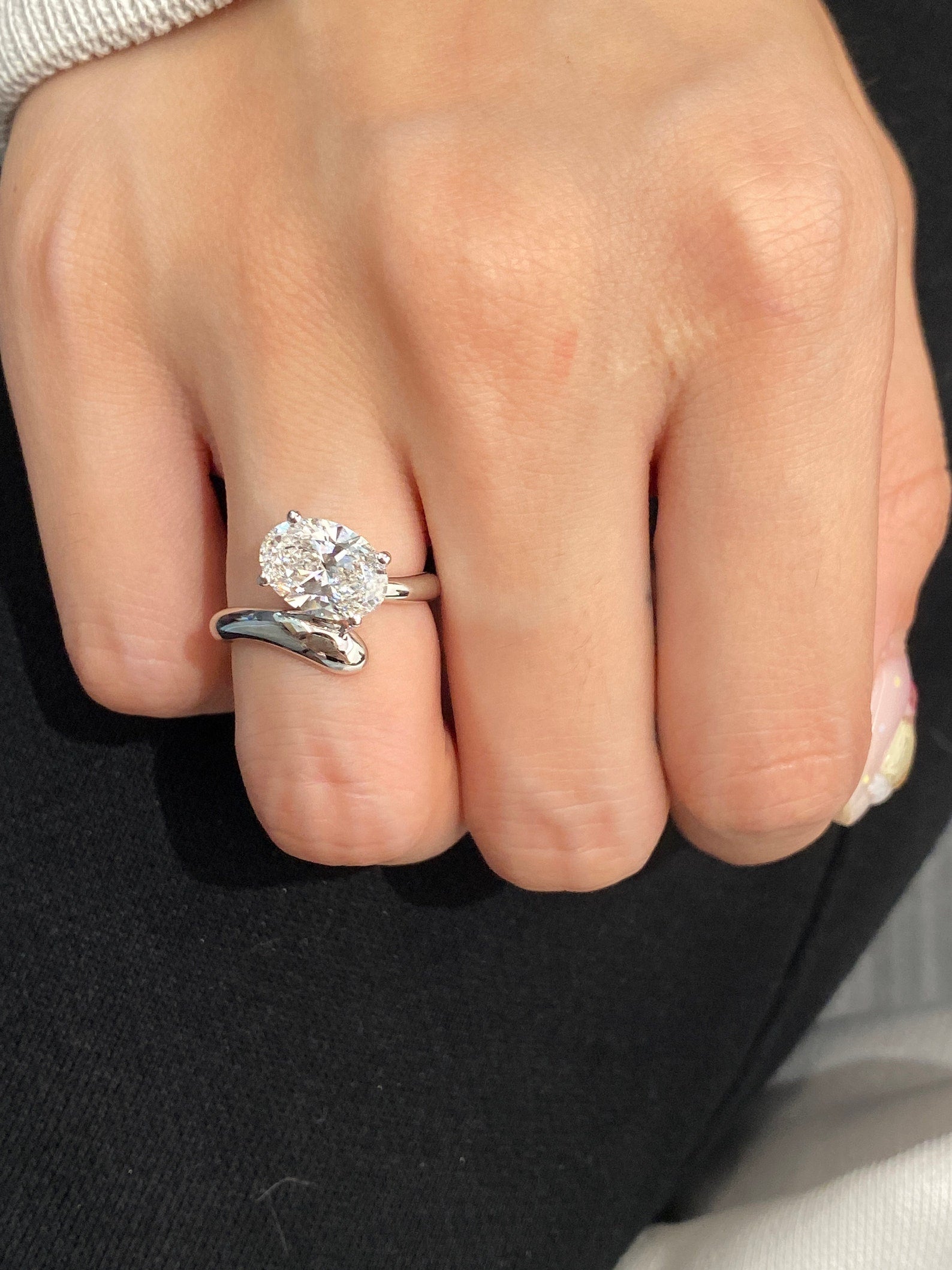 3.25 CT of love shines in this oval lab diamond ring