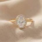 14K gold engagement ring with 3CT oval diamond halo
