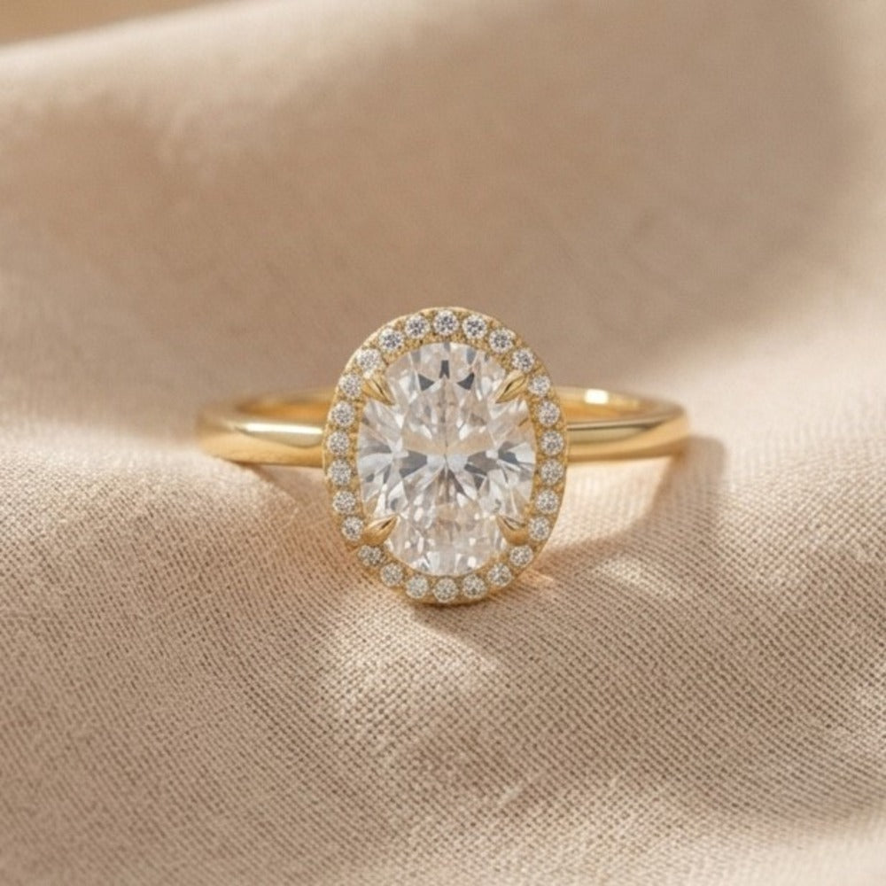 14K gold engagement ring with 3CT oval diamond halo